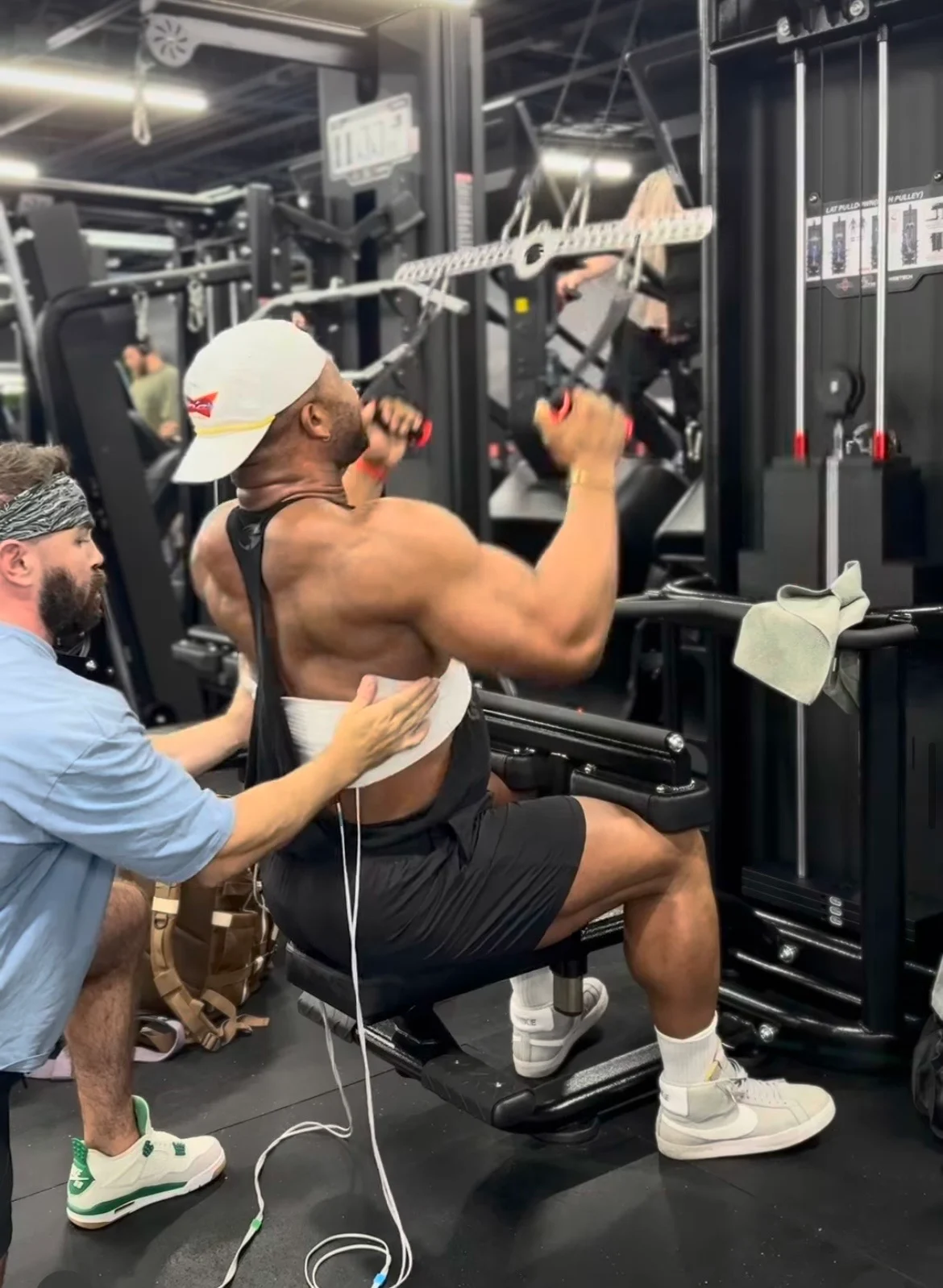 Jason providing ARPwave while a bodybuilding athlete trains at Champs Elysium