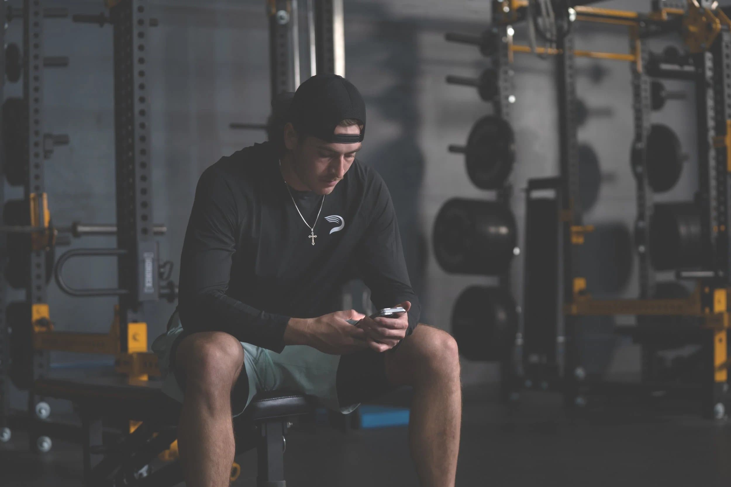Athlete filming throwing mechanics for remote video analysis